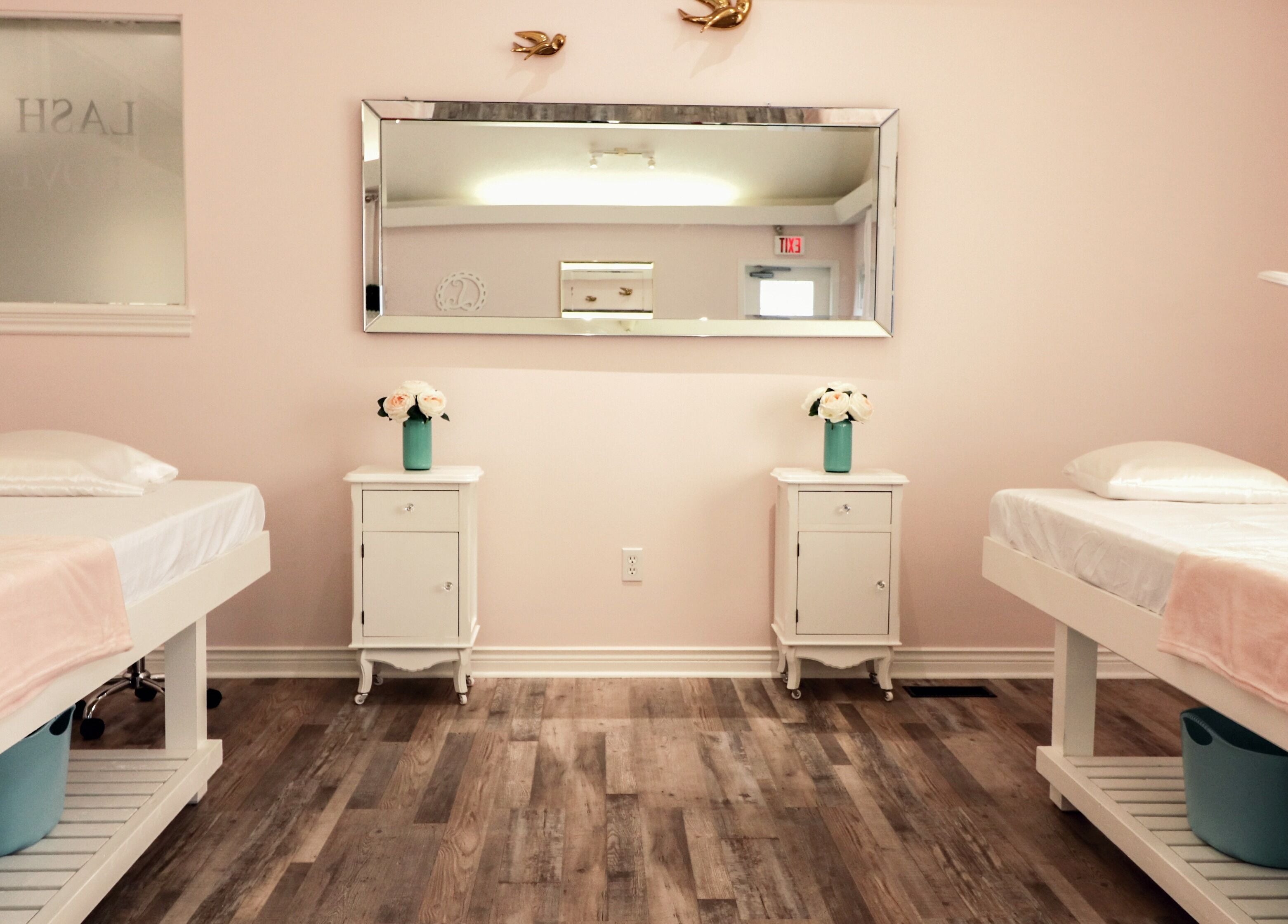 Chic interior of Lash Me Lovely - Couture Extensions Salon in Waterdown, Ontario, CA with two cozy treatment beds.