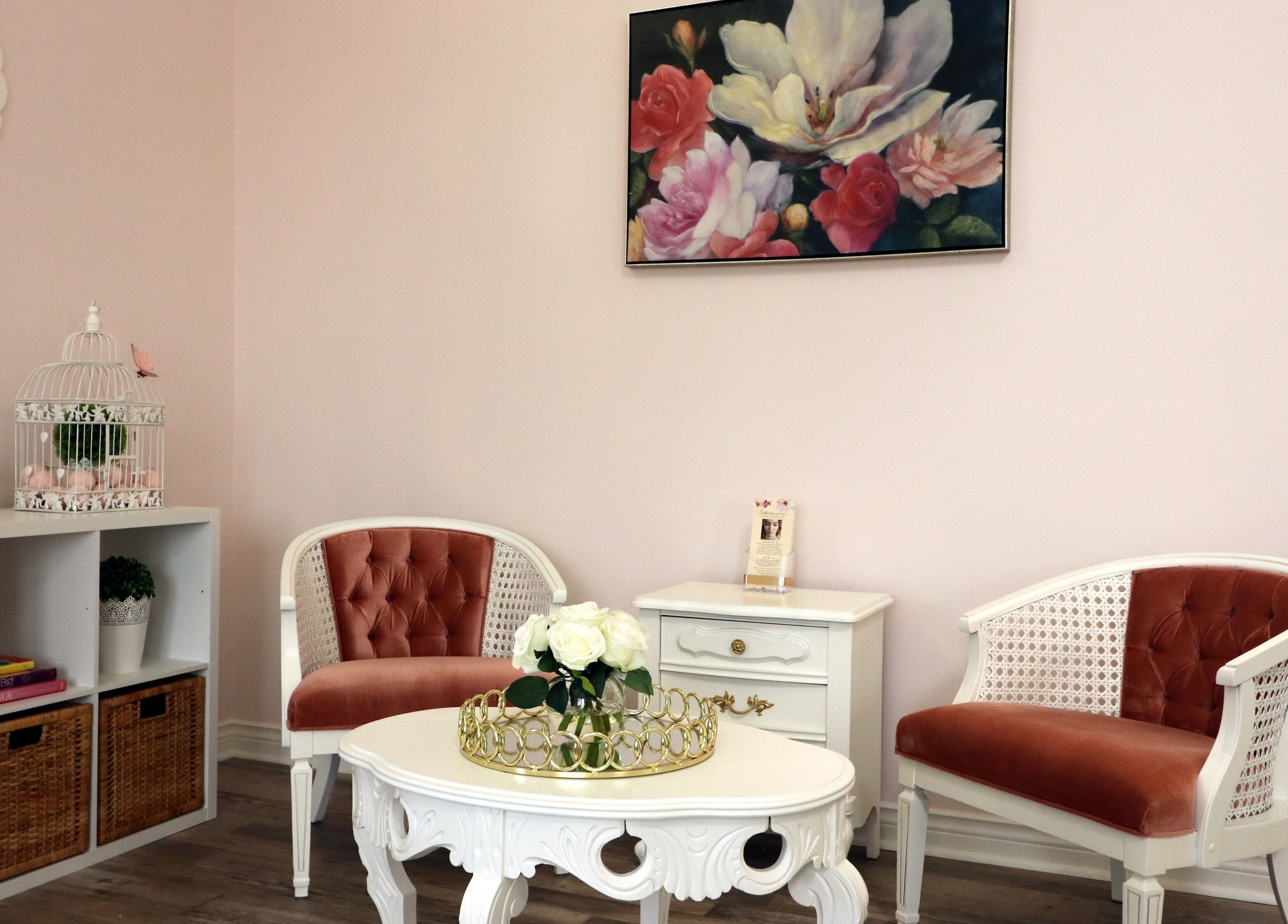 Elegant lounge area at Lash Me Lovely - Couture Extensions Salon in Waterdown, Ontario, CA with plush chairs and decor.
