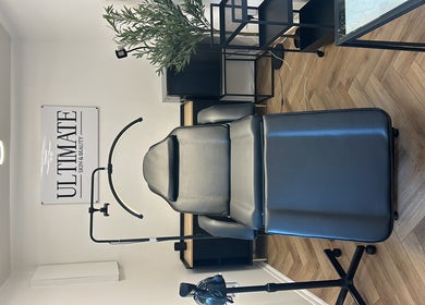 Elegant treatment room at Ultimate Skin and Beauty - Kent, Bexleyheath, England, GB with sleek modern decor.