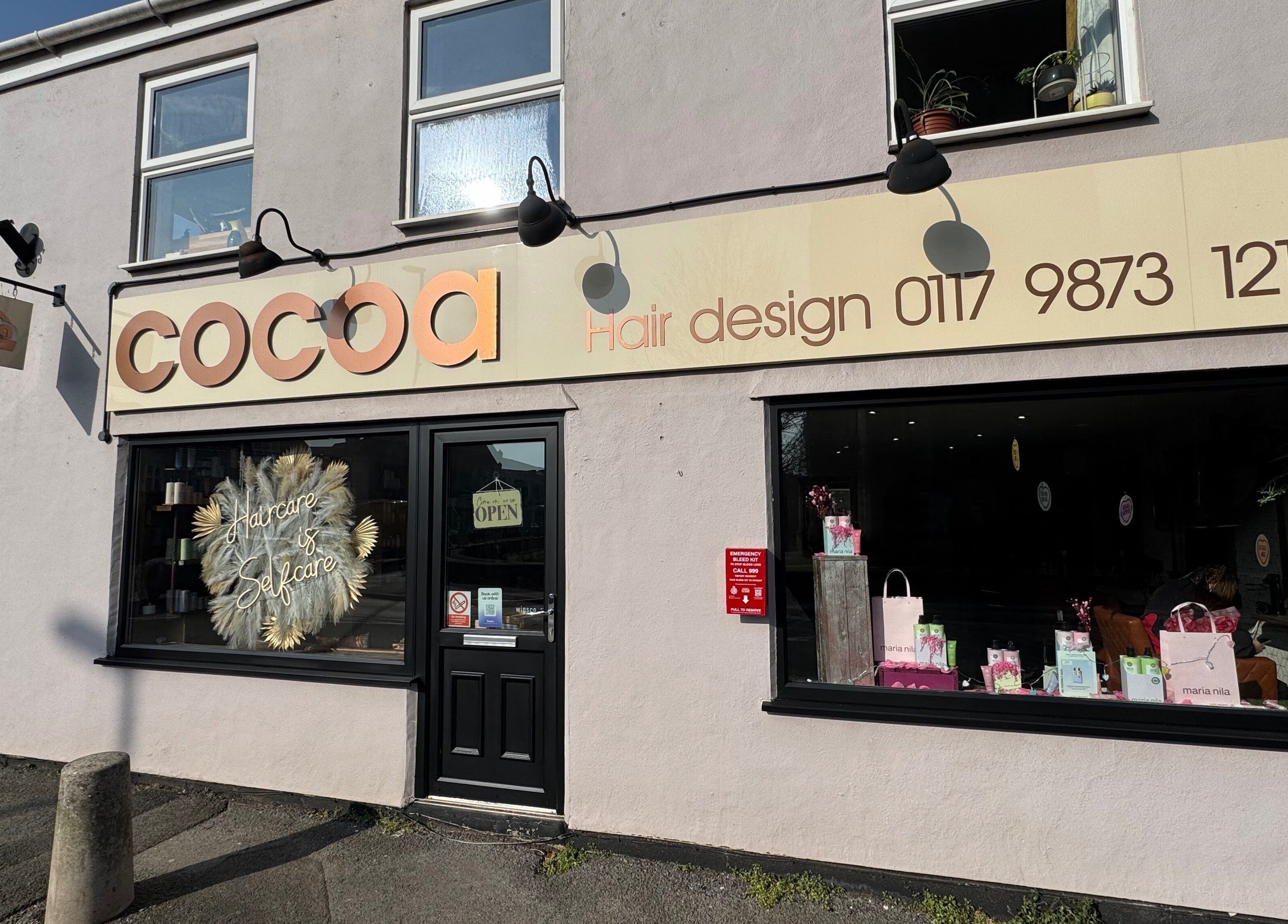 Cocoa Hair Design storefront in Keynsham, England, GB, showcasing modern design with its elegant signage.