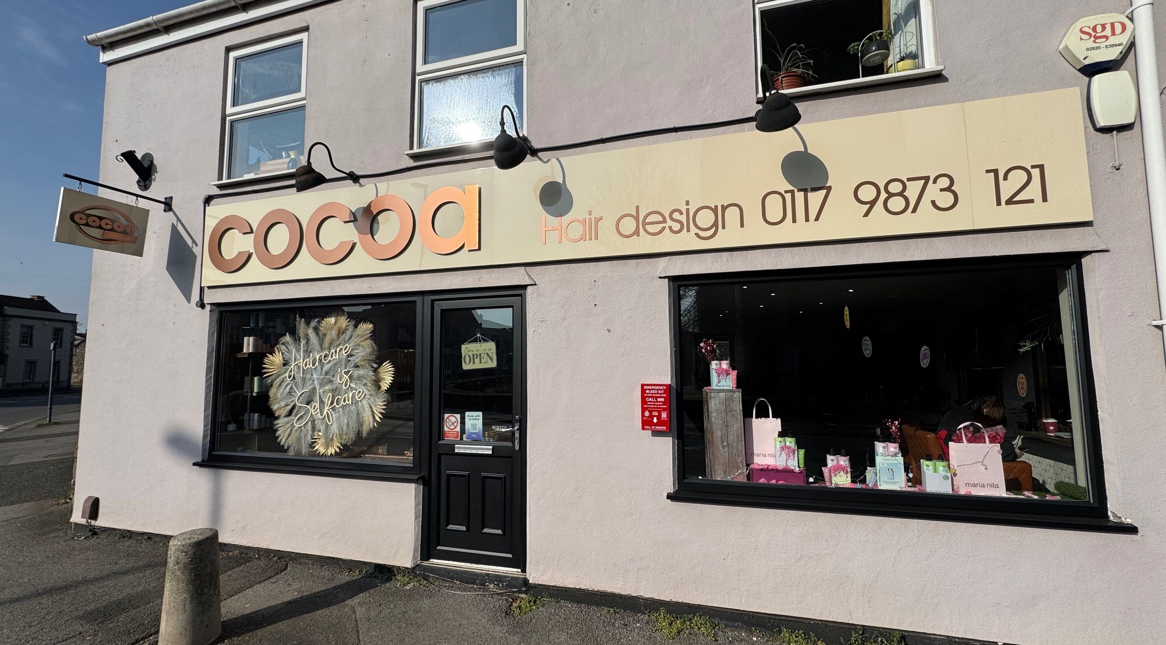 Cocoa Hair Design storefront in Keynsham, England, GB, showcasing modern design with its elegant signage.