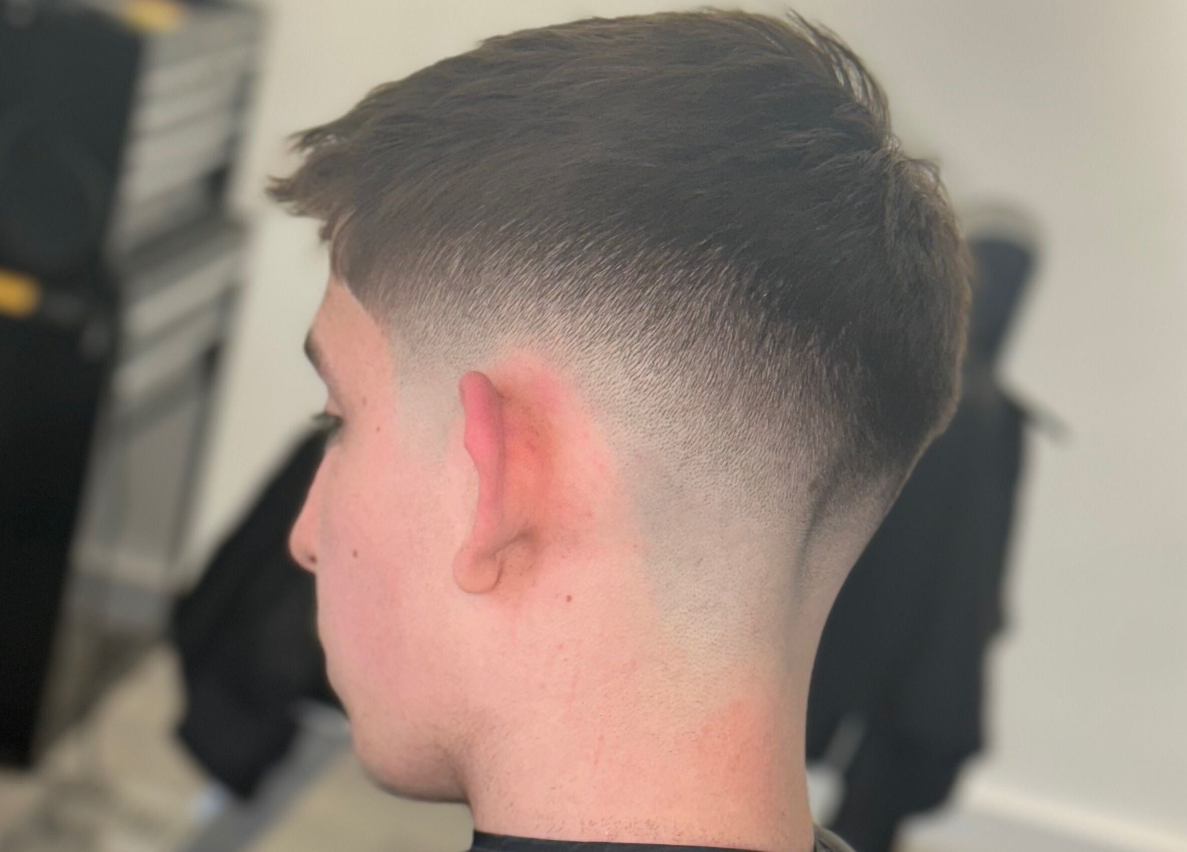 Close-up of a fresh fade haircut at John Pauls Barbershop, Lancing, England, GB.