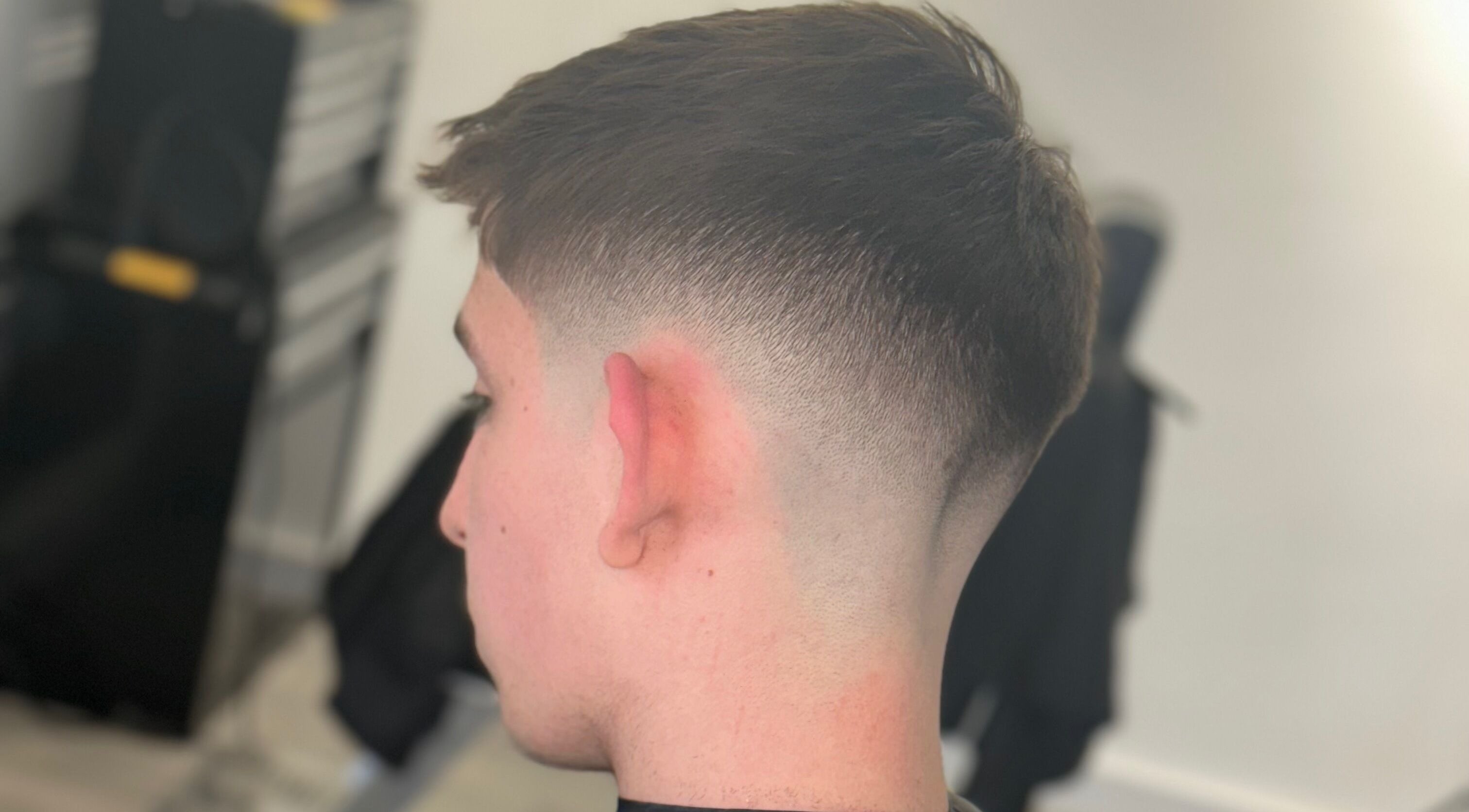 Close-up of a fresh fade haircut at John Pauls Barbershop, Lancing, England, GB.