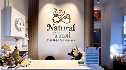 Reception area of Natural Thai Massage & Skincare in Melbourne, Victoria, AU with floral decor and welcoming ambiance.