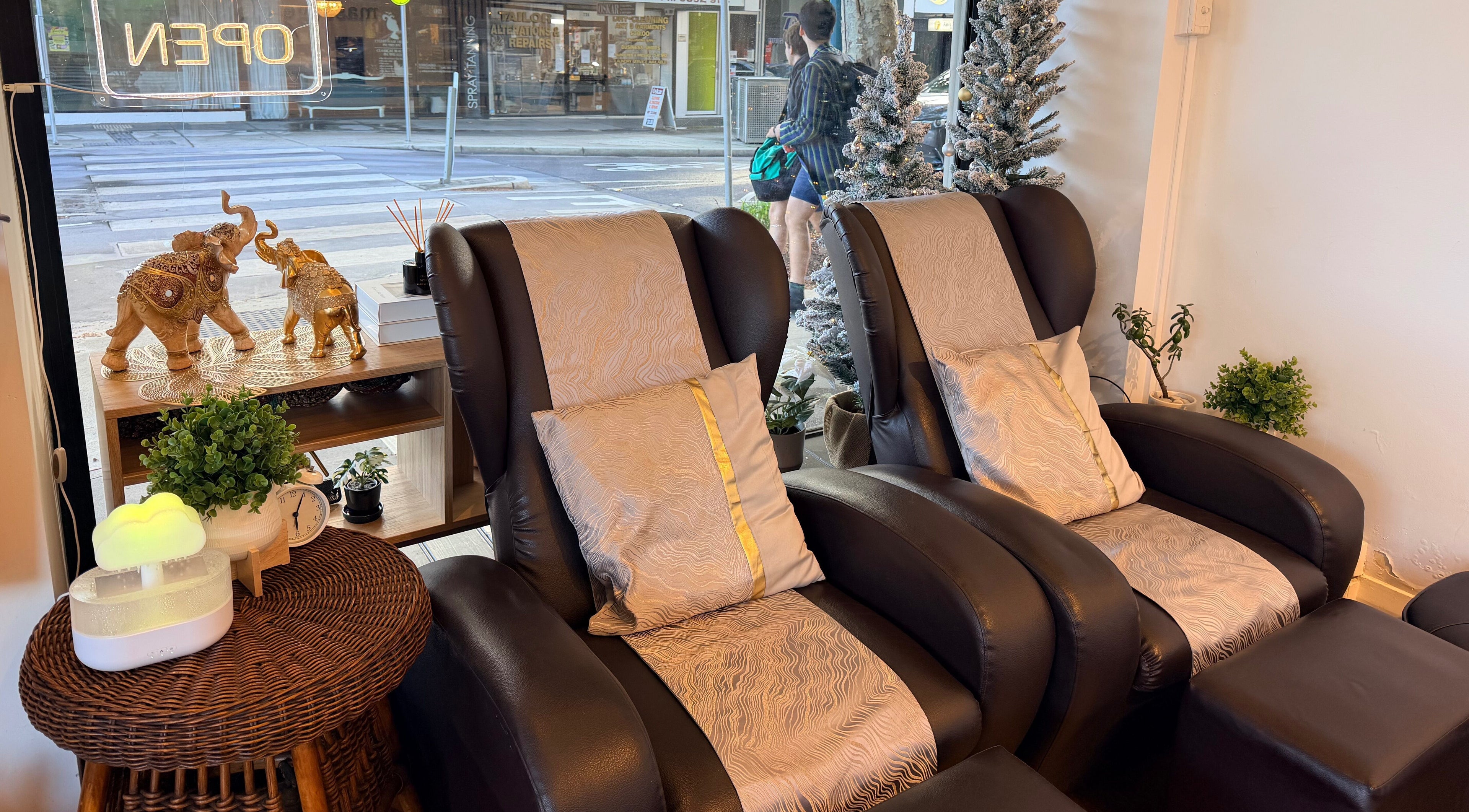 Relax in luxurious chairs at Natural Thai Massage & Skincare, Melbourne, Victoria, AU with elegant decor.