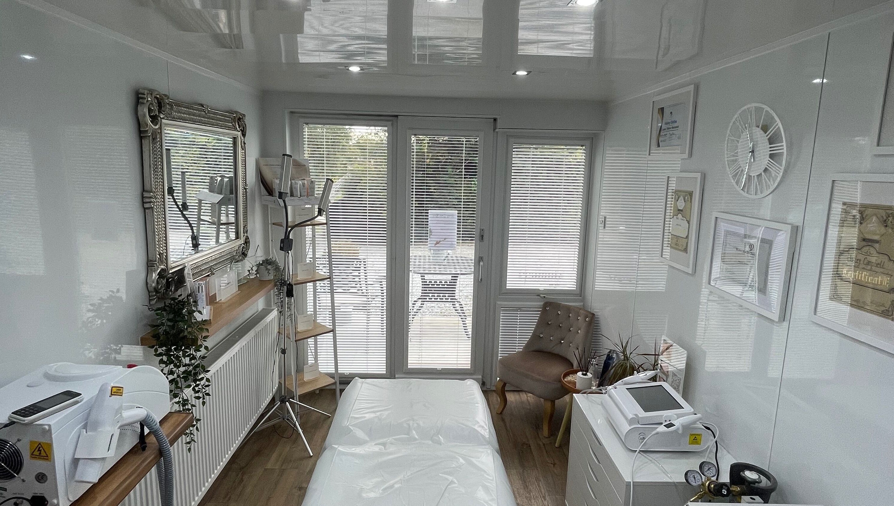 Modern treatment room at Hailey Dallas Brows, Lhanbryde, Scotland, GB featuring chic decor and advanced equipment.