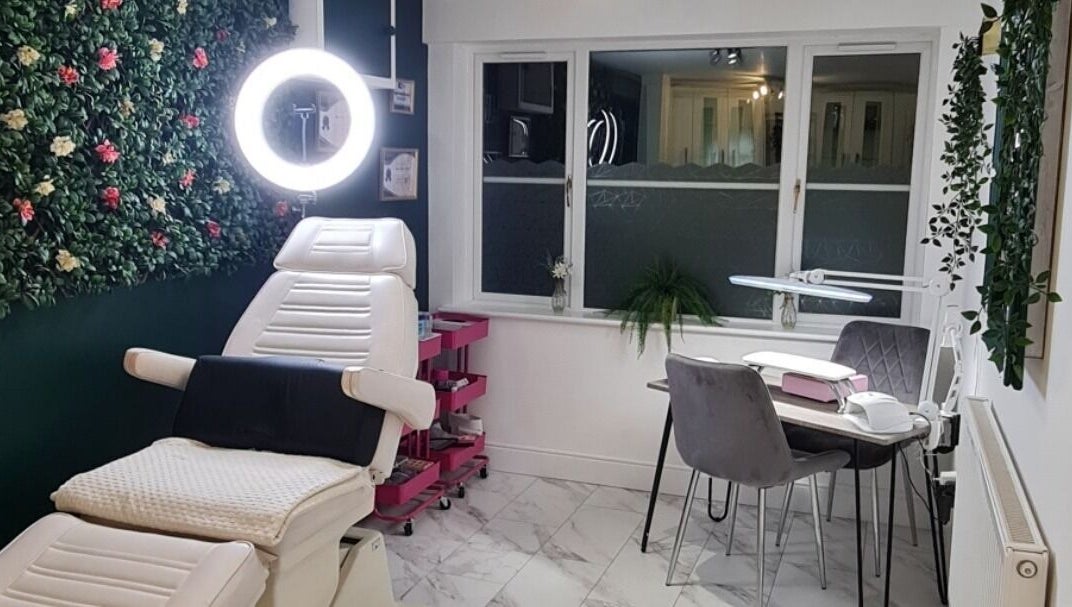 Serenity Nails By Marni in Monmouth, Wales, GB: A chic, tranquil nail salon with lush greenery and elegant seating.
