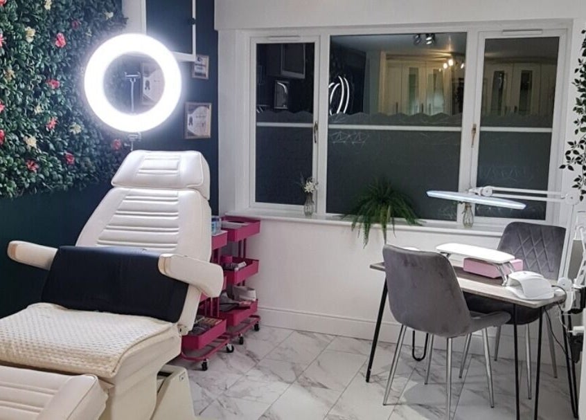 Serenity Nails By Marni in Monmouth, Wales, GB: A chic, tranquil nail salon with lush greenery and elegant seating.