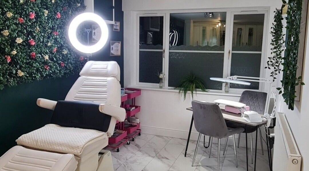Serenity Nails By Marni in Monmouth, Wales, GB: A chic, tranquil nail salon with lush greenery and elegant seating.