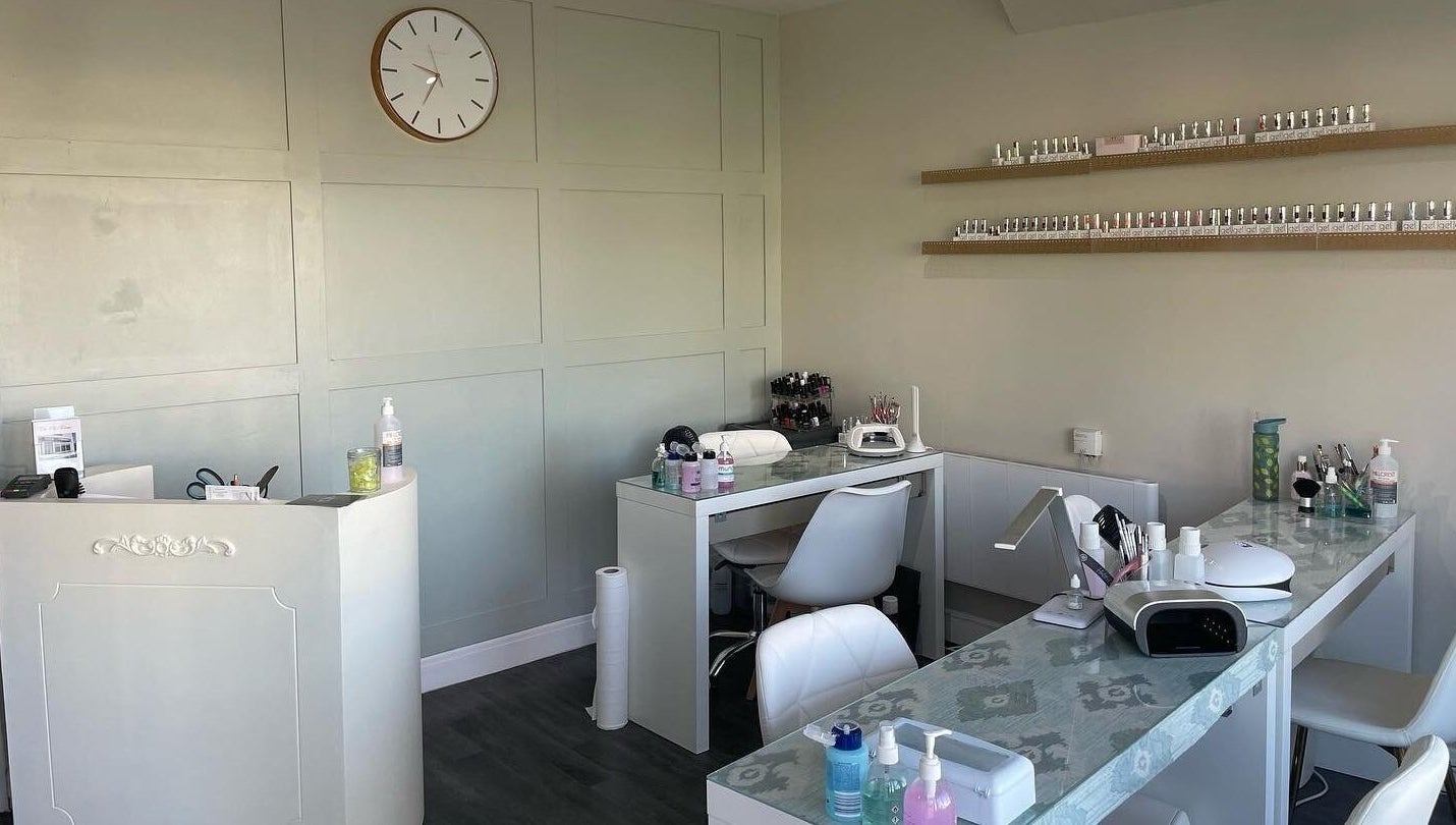 The Chi Rooms nail salon in Essington, England, GB, featuring stylish workstations and beauty products.