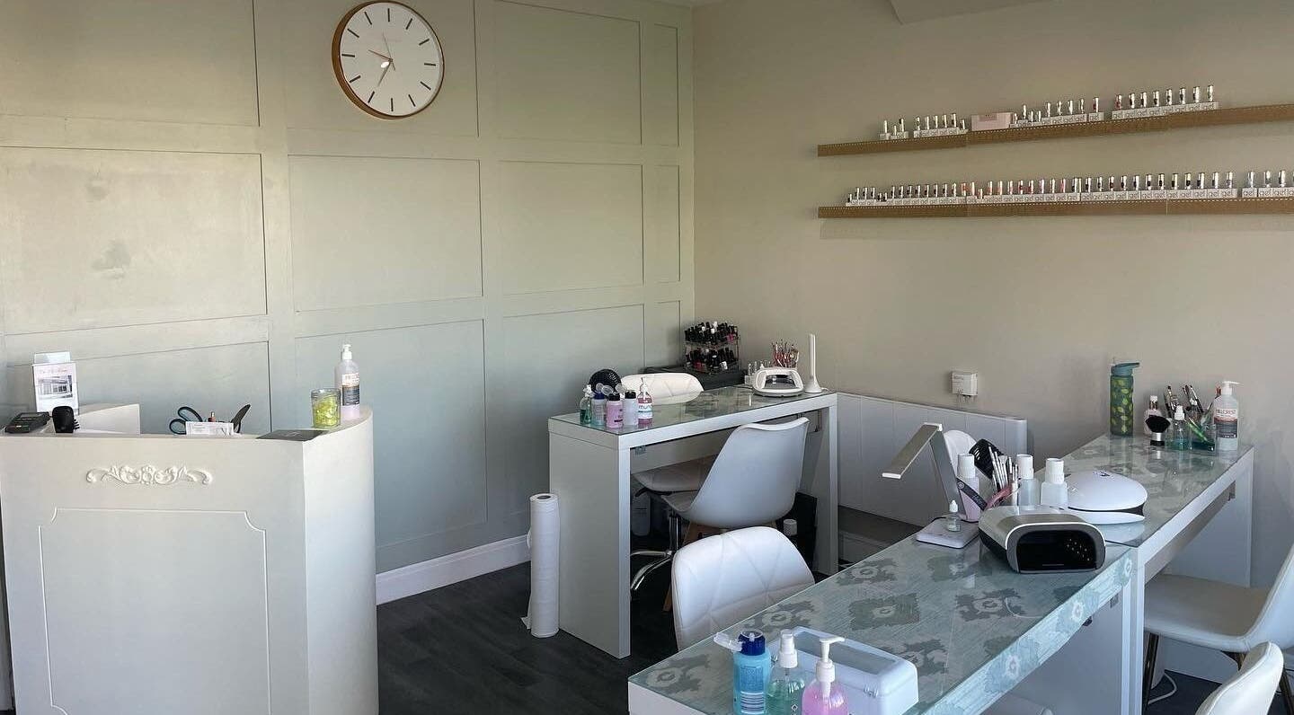 The Chi Rooms nail salon in Essington, England, GB, featuring stylish workstations and beauty products.