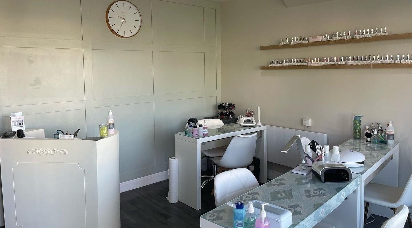 The Chi Rooms nail salon in Essington, England, GB, featuring stylish workstations and beauty products.