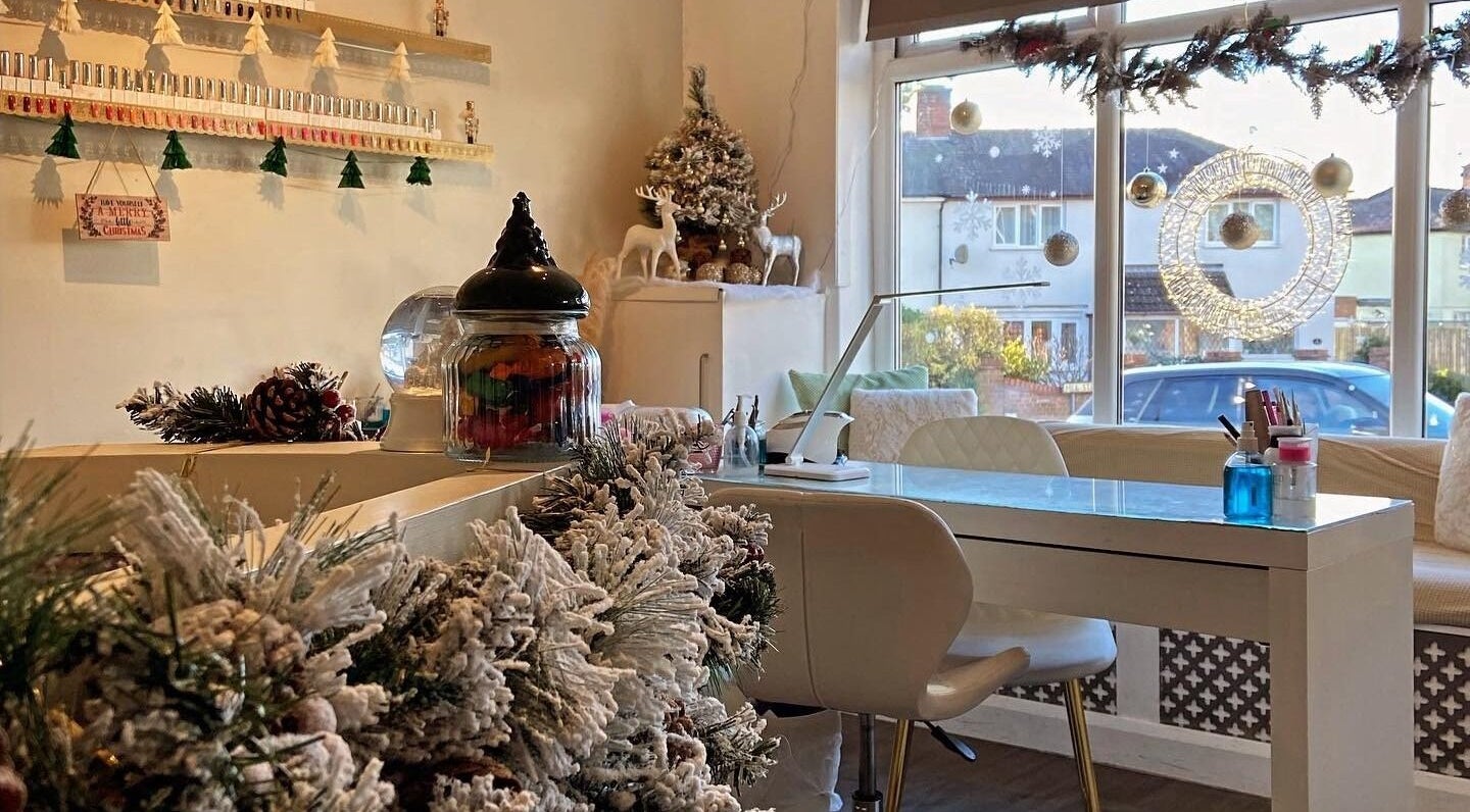Festive decorations at The Chi Rooms, Essington, England, GB enhance the cozy beauty salon atmosphere.