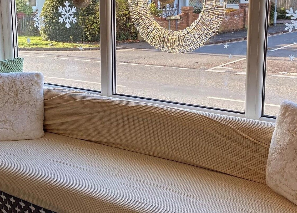 Relaxing seating area by the window at The Chi Rooms, Essington, England, GB, perfect for unwinding.