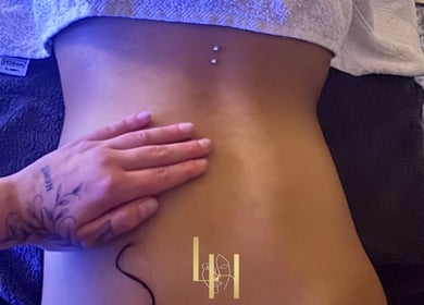 Relaxing abdominal massage at Leyla’s Holistic Therapies, St Albans, England, GB, promoting tranquility and wellness.