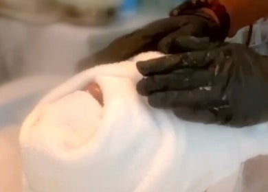 Spa treatment with towel wrap at Radiance by Raytillia Salon and Mini Spa, Brunswick, Georgia, US.