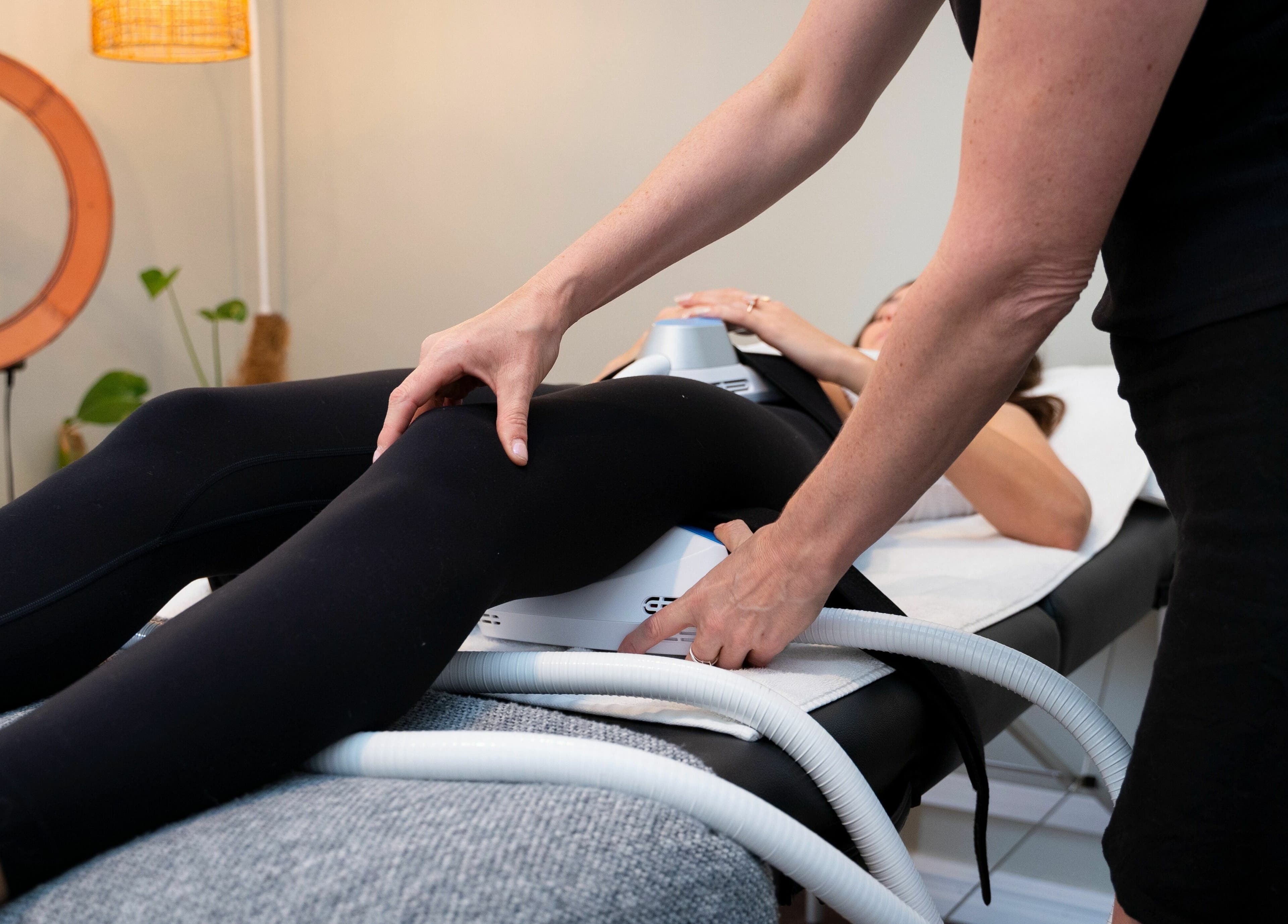 Body sculpting treatment in progress at Peachy Body Sculpting, Tuart Hill, Western Australia, AU.