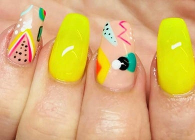 Vivid nail art displayed at Savannah Sky Salon, Neyland, Wales, GB. Vibrant colors and intricate designs.