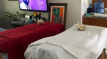 Massage tables at Body and Skin Treatments by Michelle, Nassau, New Providence, BS, with relaxing decor.