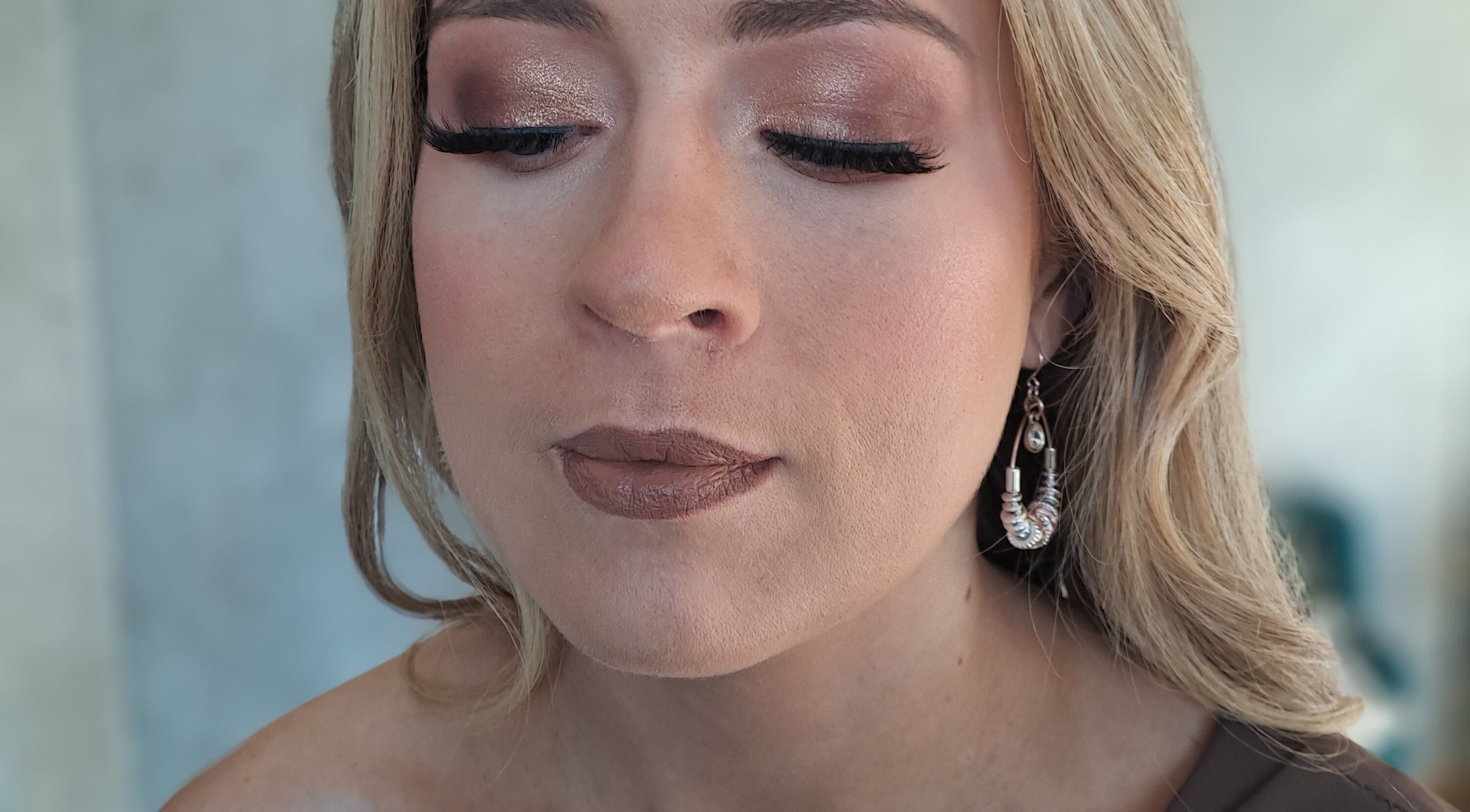 Elegant makeup at Beauty by Hailey Anderson, Larkhall, Scotland, GB featuring bronze eyelids and nude lips.