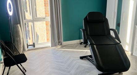 Comfortable treatment chair at Face Me Aesthetics, Arborfield Green, England, GB.