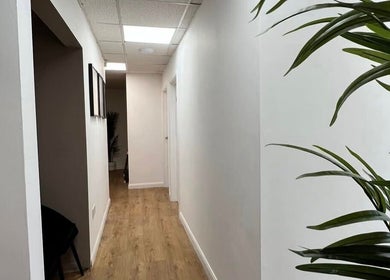 Hallway with plants at Face Me Aesthetics, Arborfield Green, England, GB.