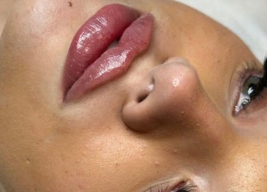 Close-up of glowing skin and lips at Face Me Aesthetics, Arborfield Green, England, GB.
