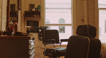 Cozy, vintage salon interior at That Was Then, This is Now in Wellington, Wellington, NZ with styled chairs.