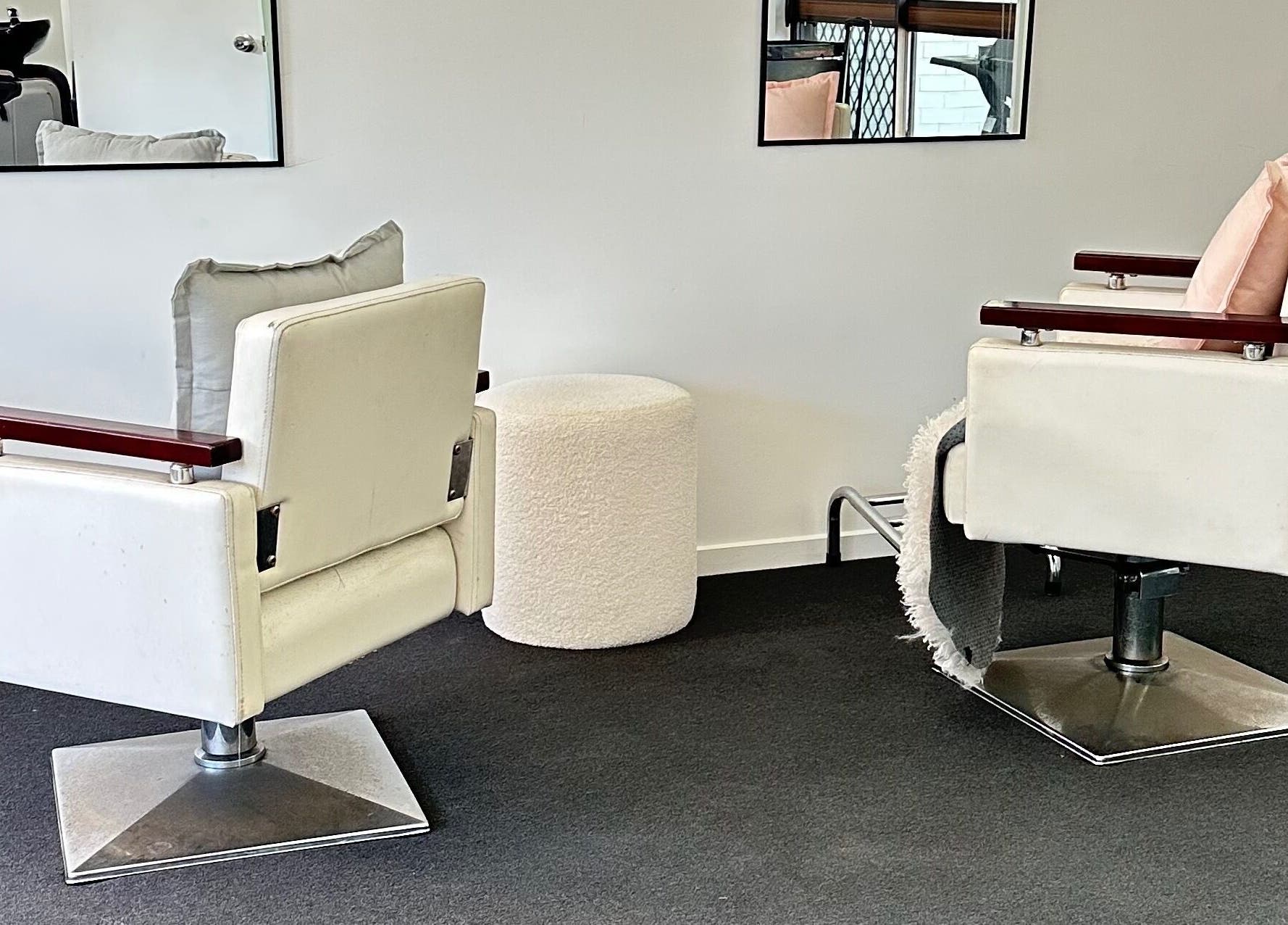 Modern salon chairs at Dreamy Looks By Kara, Ashmore, Queensland, AU offer comfort and style.