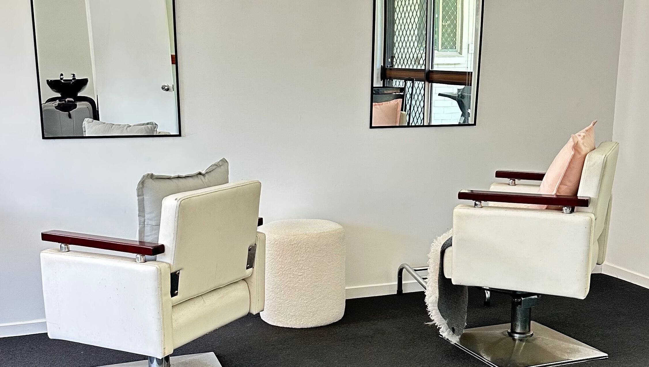 Elegant salon chairs in Dreamy Looks By Kara, Ashmore, Queensland, AU, offering a modern beauty experience.