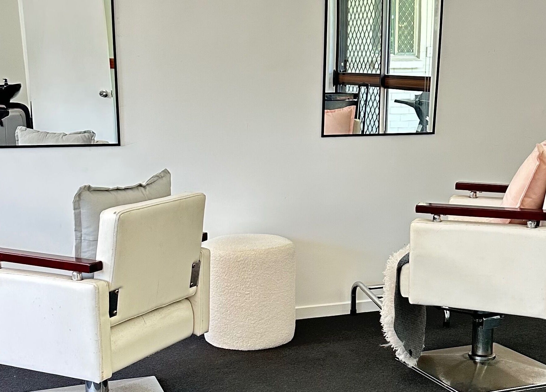 Elegant salon chairs in Dreamy Looks By Kara, Ashmore, Queensland, AU, offering a modern beauty experience.
