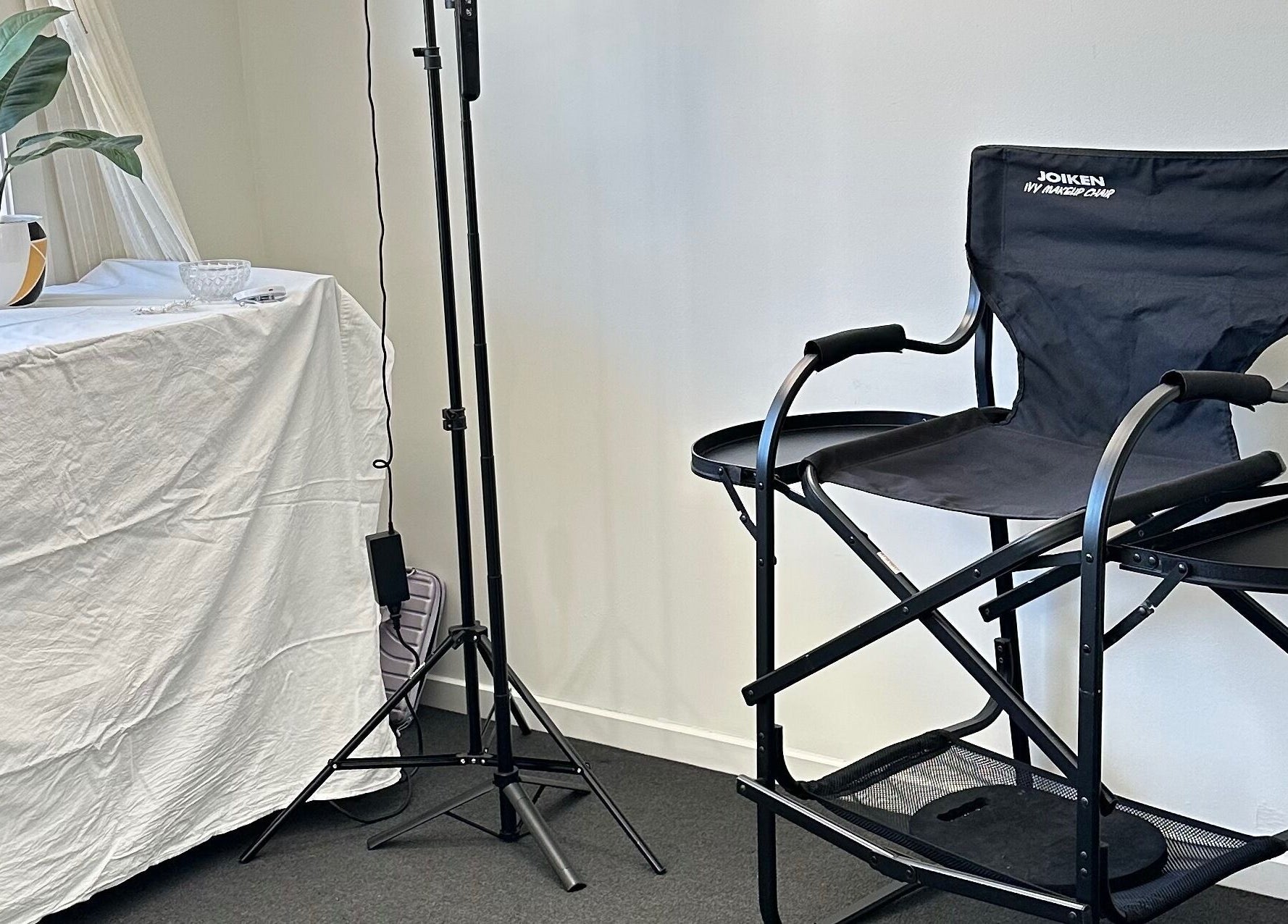 Dreamy Looks By Kara in Ashmore, Queensland features a chic makeup chair and vanity station.