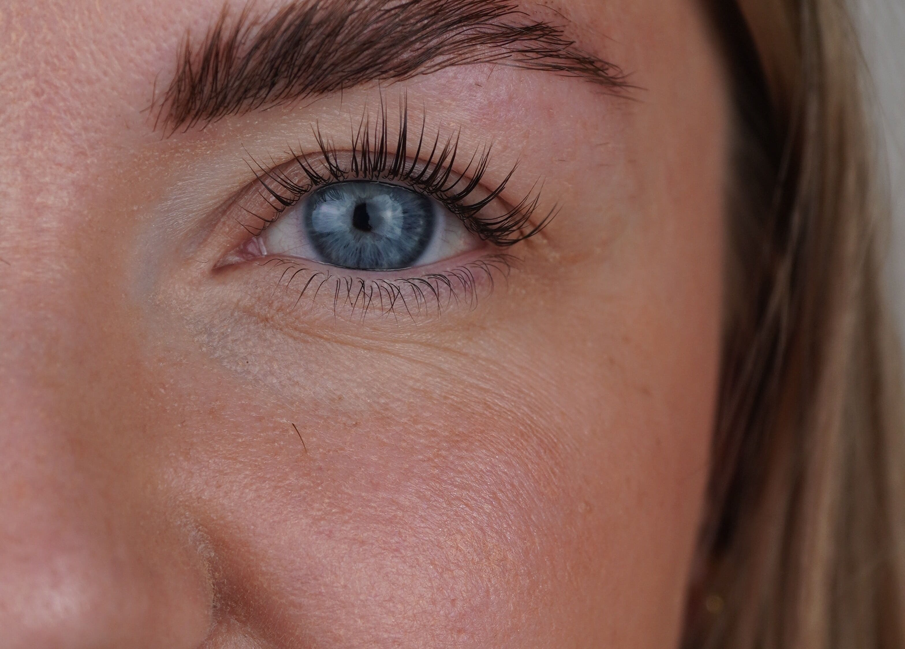 Close-up of eye showcasing eyelash extensions at Manchester Lashes | Jean Studios | Ancoats Beehive Mill, Manchester, England, GB.