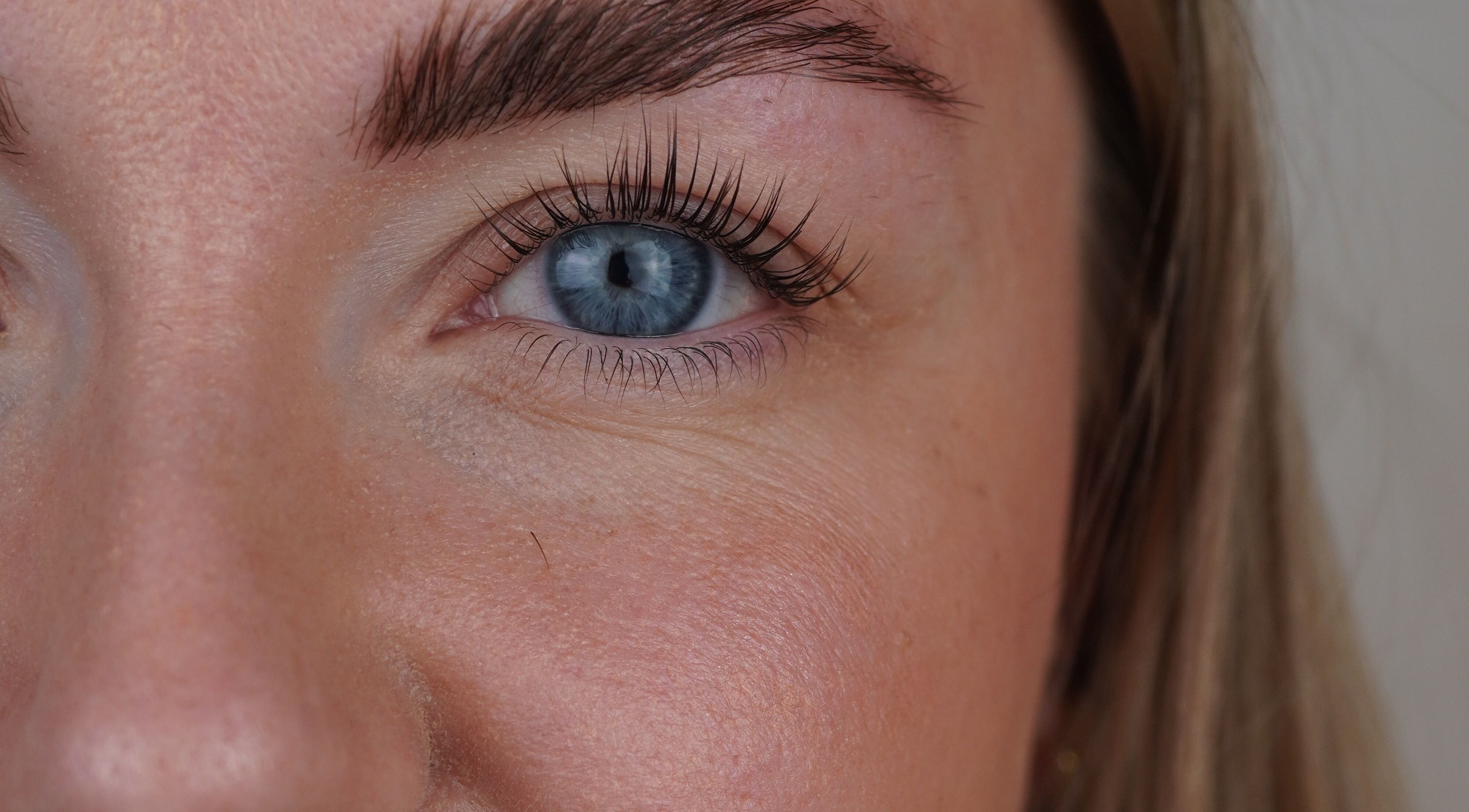 Close-up of eye showcasing eyelash extensions at Manchester Lashes | Jean Studios | Ancoats Beehive Mill, Manchester, England, GB.