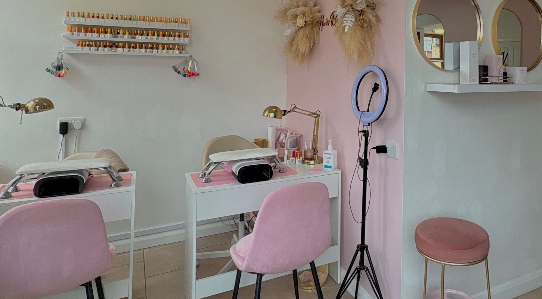 Nail station at ByBeth inside Hair by EP Salon, Heywood, England, GB, featuring plush pink decor.
