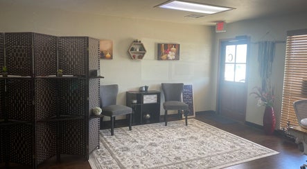Cozy waiting area at Touch of Serenity Wellness Spa in Moore, Oklahoma, US with elegant décor and seating.