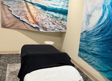 Tranquil massage room at Touch of Serenity Wellness Spa, Moore, Oklahoma, US with ocean-themed decor.