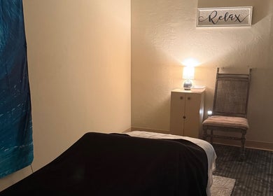 Peaceful massage room at Touch of Serenity Wellness Spa in Moore, Oklahoma, US, with calming decor.