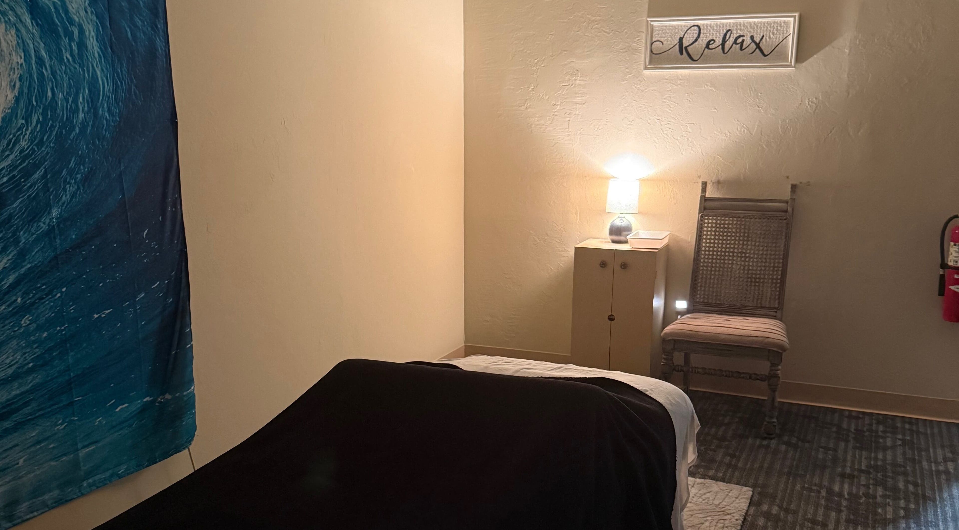 Relaxing room at Touch of Serenity Wellness Spa in Moore, Oklahoma, US with calming decor.