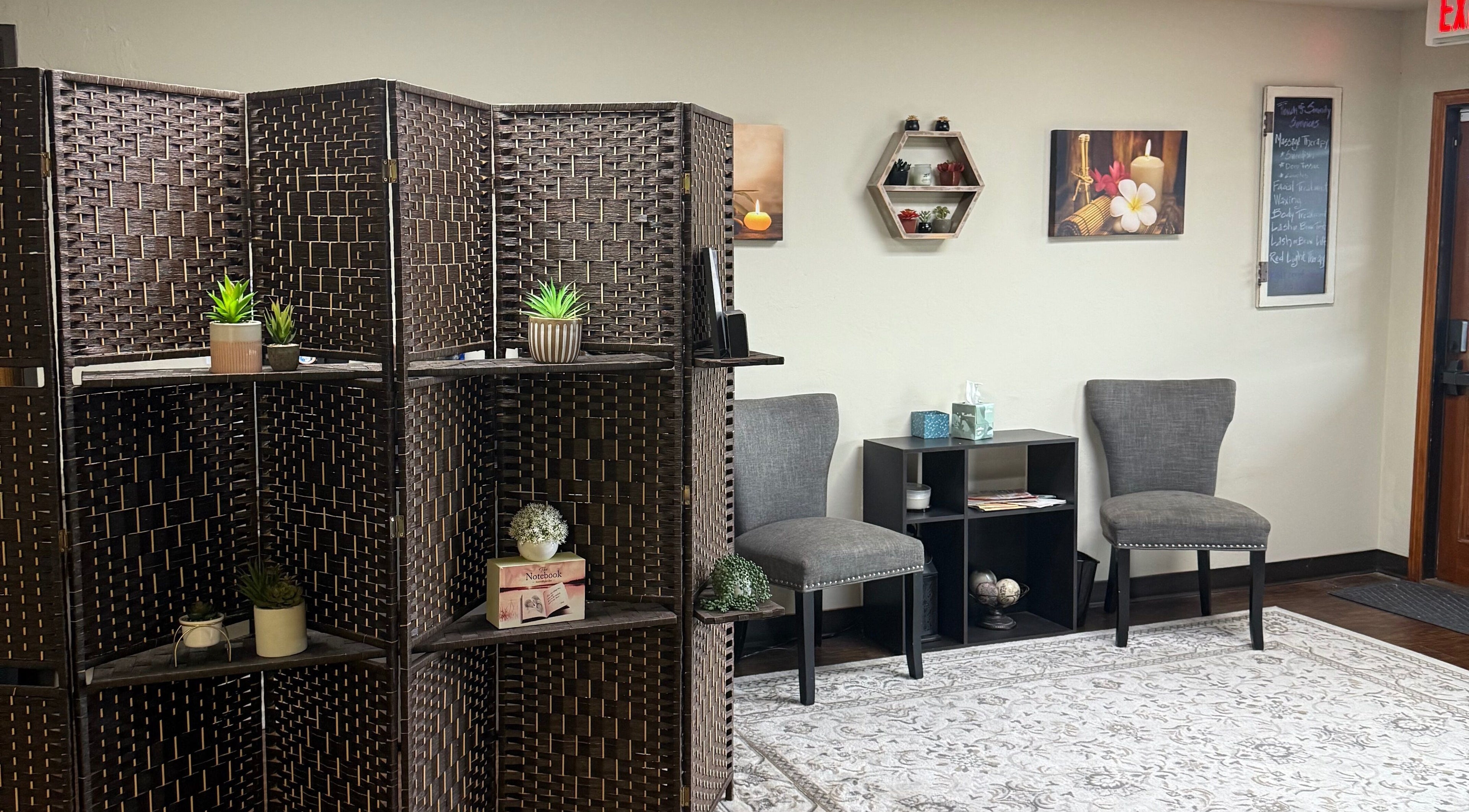 Cozy waiting area with elegant chairs and decor at Touch of Serenity Wellness Spa, Moore, Oklahoma, US.