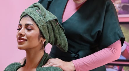 Relaxing massage session at PMC Beauty & Herbs, Shah Alam, Selangor, MY. Woman enjoying pampering in spa setting.