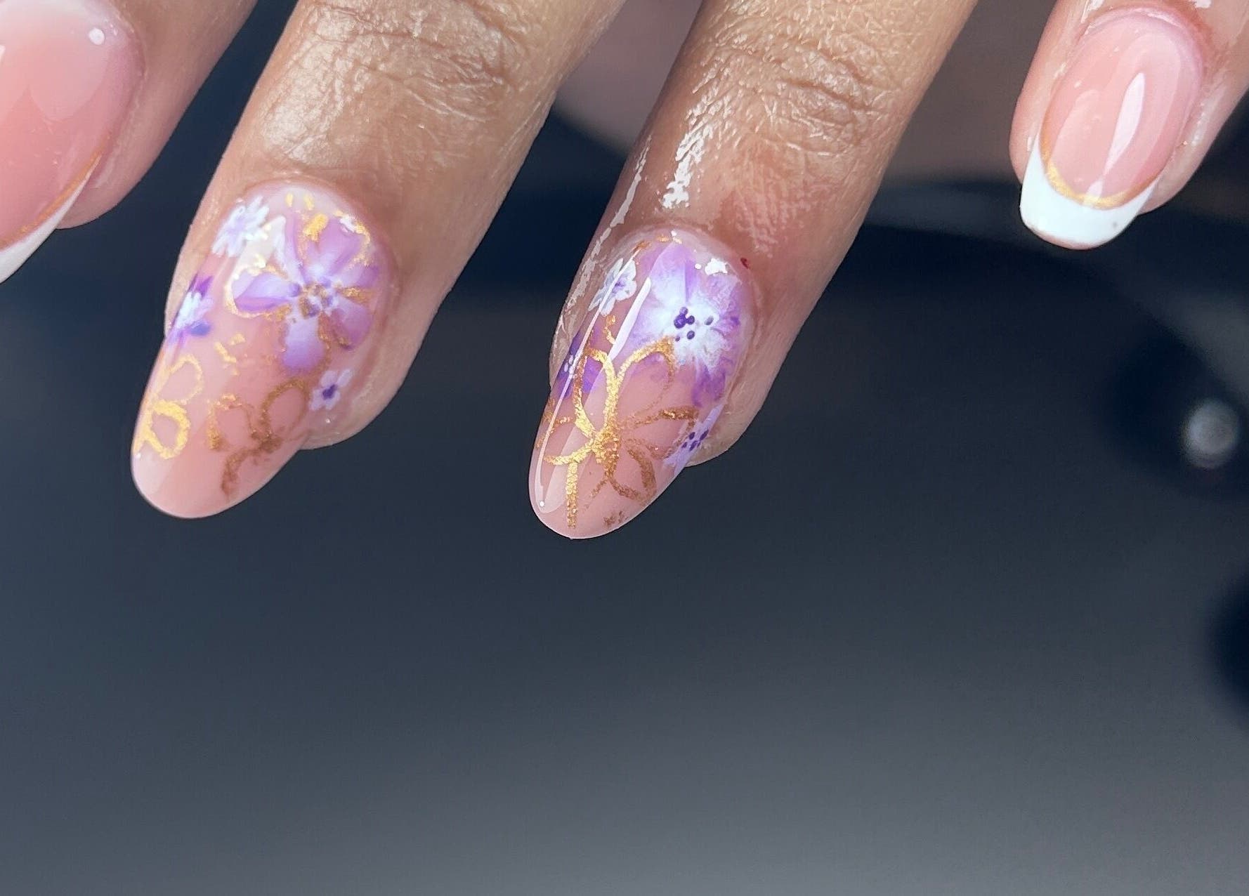 Elegant nail art with floral designs at Karolina.Nails & Beauty, Slough, England, GB.