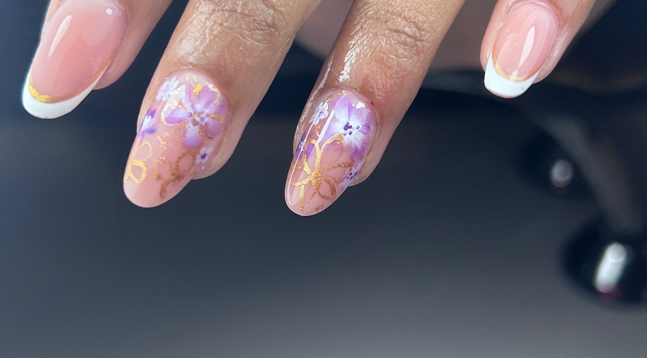 Elegant nail art with floral designs at Karolina.Nails & Beauty, Slough, England, GB.