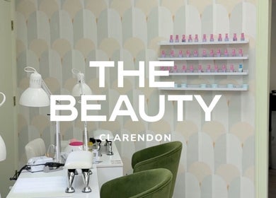 Interior of The Beauty Clarendon Nails and Body Services, Arlington, Virginia, showcasing nail workstations.