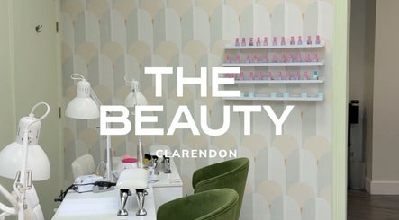 Interior of The Beauty Clarendon Nails and Body Services, Arlington, Virginia, showcasing nail workstations.