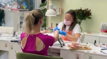 Client receives manicure at The Beauty Clarendon Nails and Body Services in Arlington, Virginia, US.