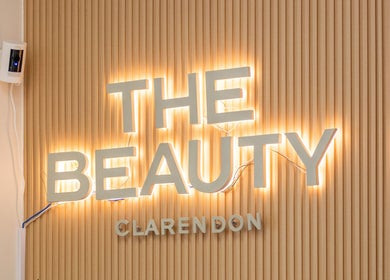 Illuminated sign at The Beauty Clarendon Nails and Body Services in Arlington, Virginia, US.