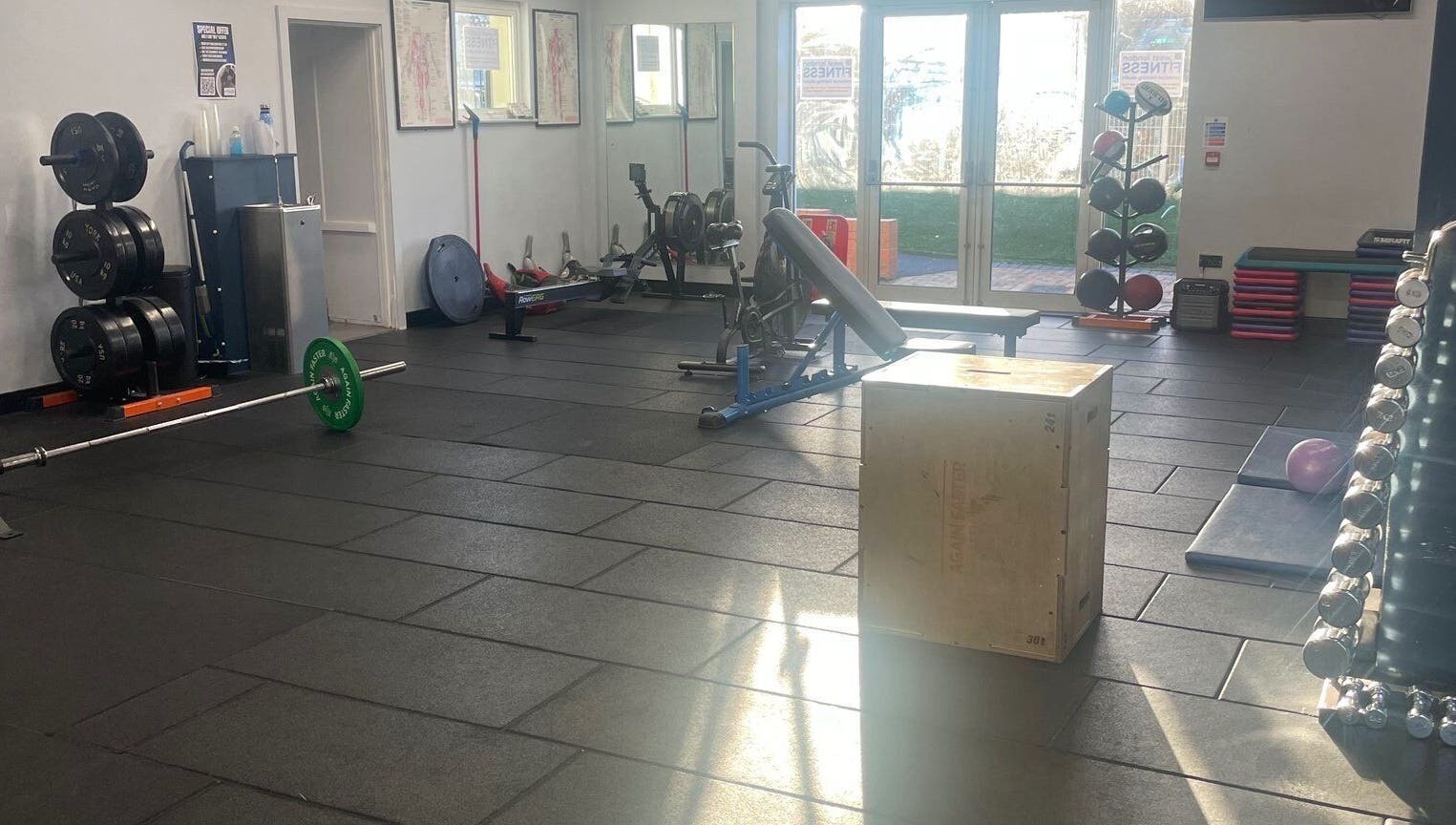 Spacious gym at Carol Redman Personal Training, London, England, GB, with fitness equipment and natural lighting.