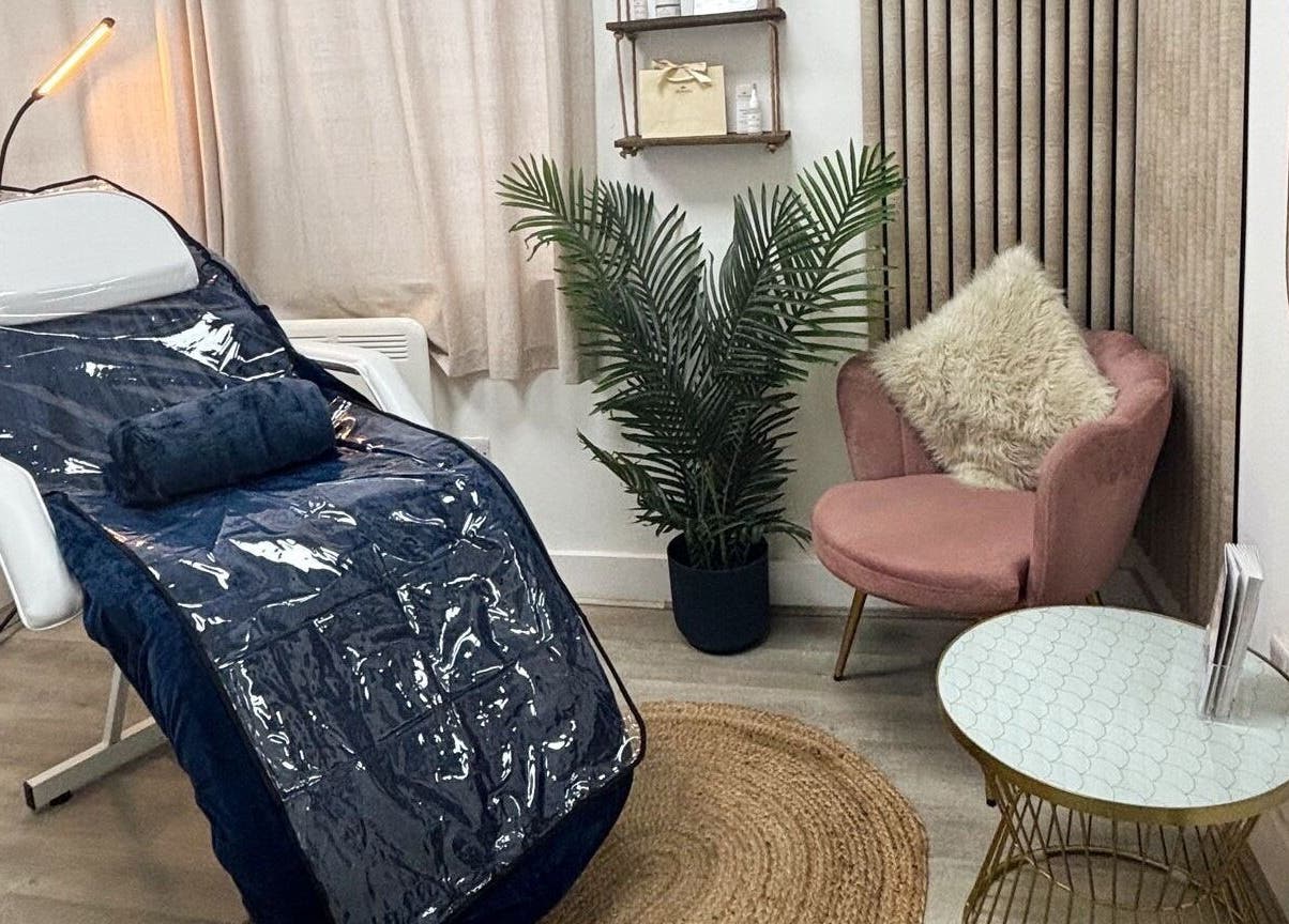 Relaxing treatment room at DR.S Clinic, Prestwich, England, GB, featuring a treatment bed and elegant decor.