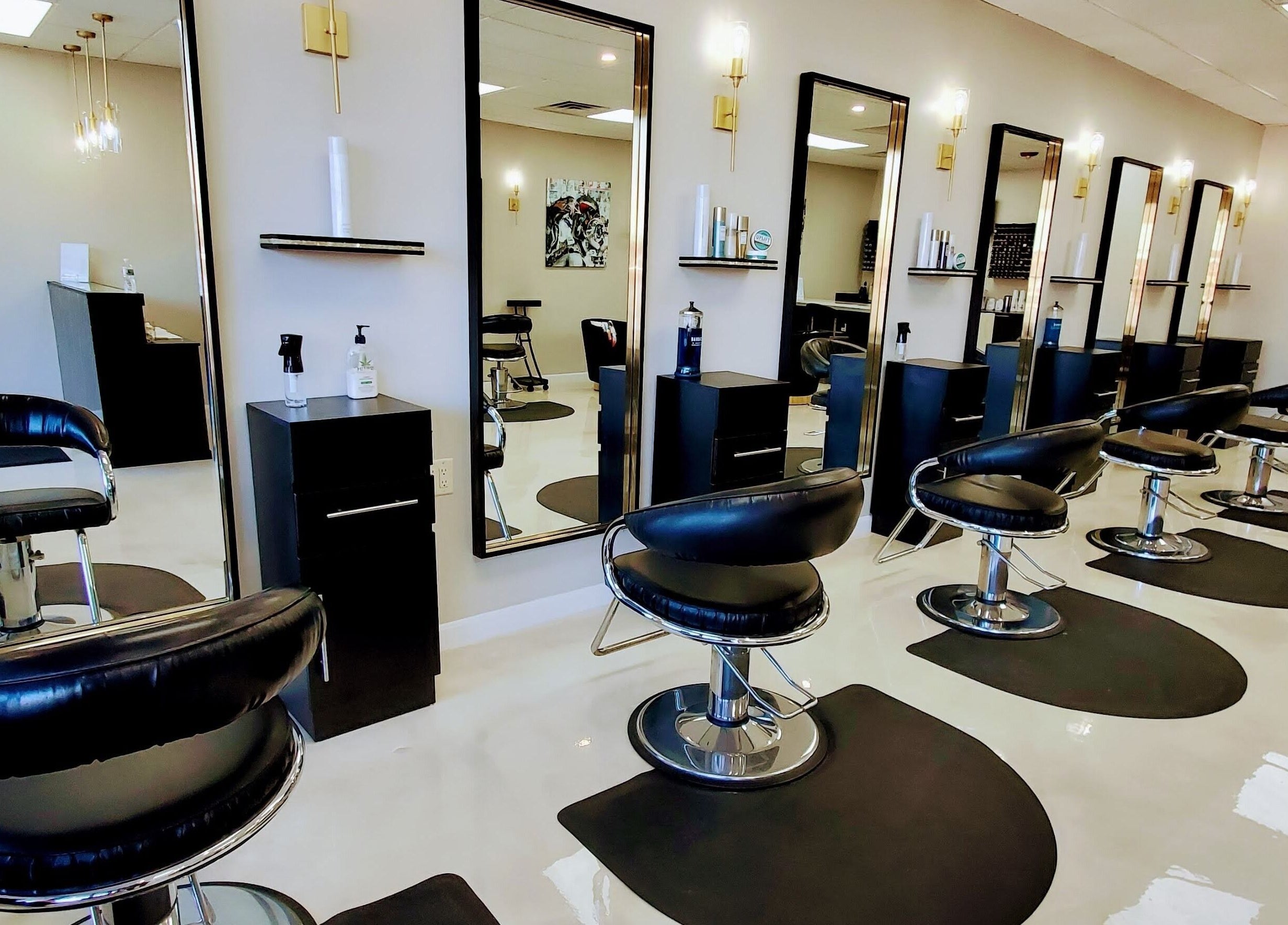 Stylish salon interior with modern chairs at Salon Secora, Saugus, Massachusetts, US.